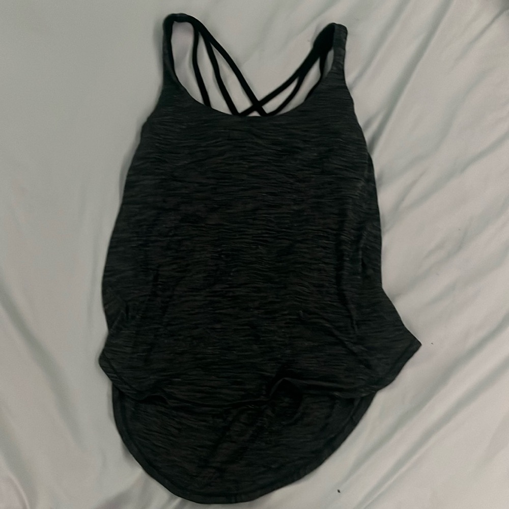 Lululemon Free to be tank top
Built in bra ( no padding inside ) with open back